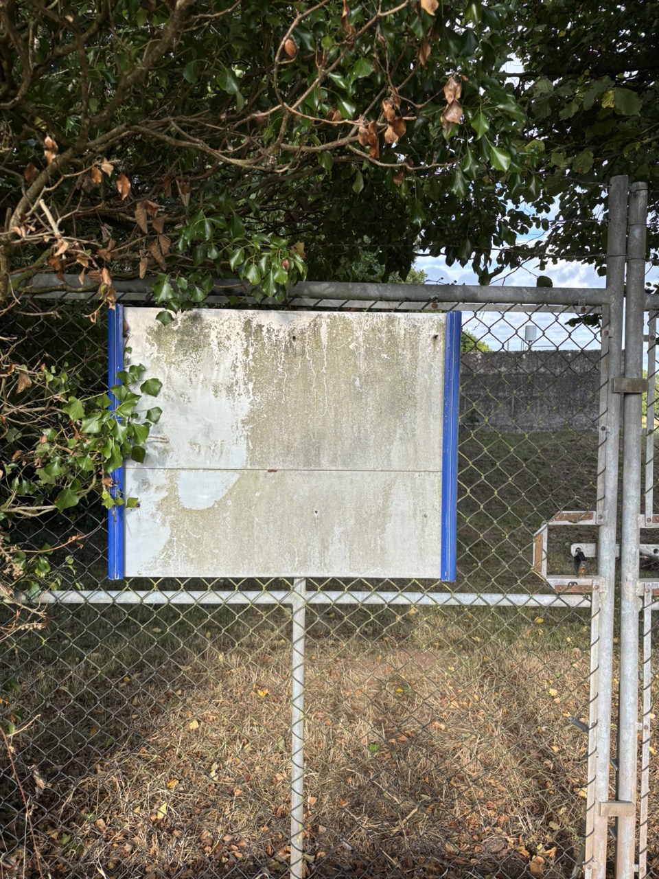 Weathered sign, now blank